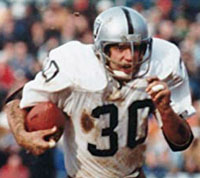 Ira Matthews of the Oakland Raiders returns a kickoff against the