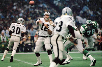 Ira Matthews of the Oakland Raiders returns a kickoff against the