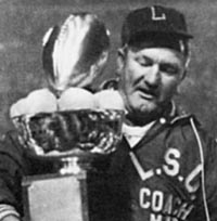 Coach McClendon with Peach Bowl Trophy