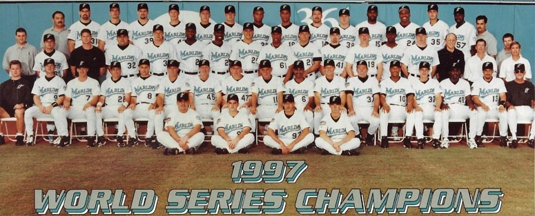 LIVAN HERNANDEZ FLORIDA MARLINS 1997 WS CHAMPS ACTION SIGNED 8x10