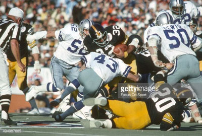 Multiple Pittsburgh Steelers walk into stadium donning Franco