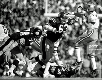 Dallas Cowboys quarterback Roger Staubach (12) in action against the  Pittsburgh Steelers during Super Bowl X aga…